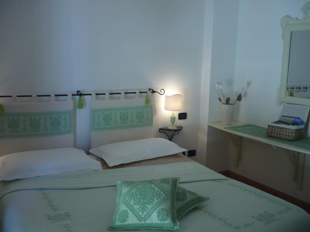 Le Pavoncelle Apartment Alghero Phòng bức ảnh
